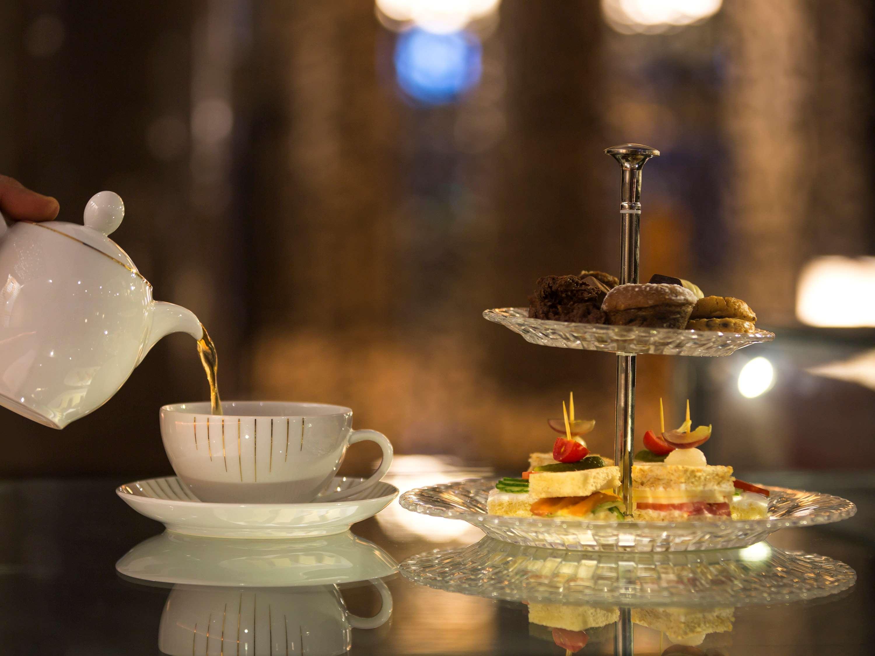 Mövenpick Hotel du Lac Tunis Exteriör bild Afternoon tea